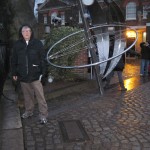 Astride the Prime Meridian, in the rain. The real tourists were queued up to pose before a plaque, for some reason.